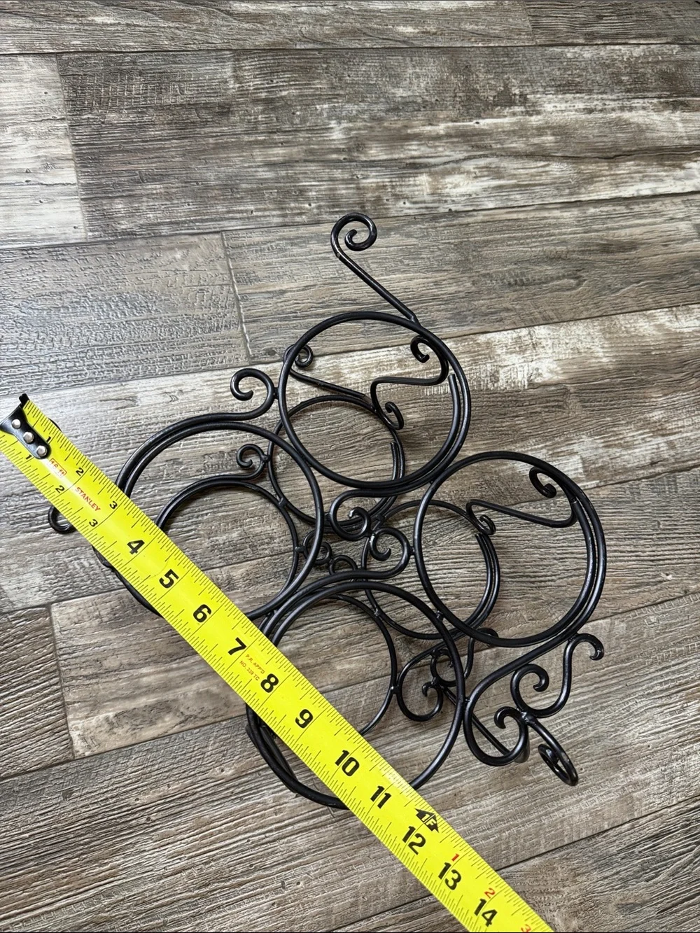 Decorative Black Metal Wall Wine Shelf - 4-Bottle Scroll Design